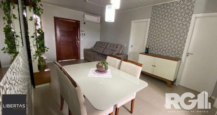 Casa com 2 quartos à venda na Rua Seis de Novembro, 2010, Mário Quintana, Porto Alegre