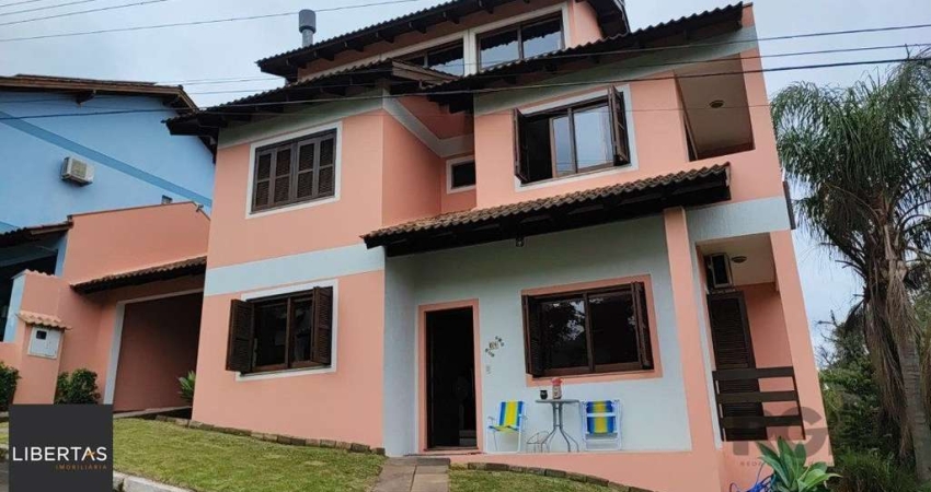 Casa em condomínio fechado com 4 quartos à venda na Avenida Vicente Monteggia, 2000, Cavalhada, Porto Alegre