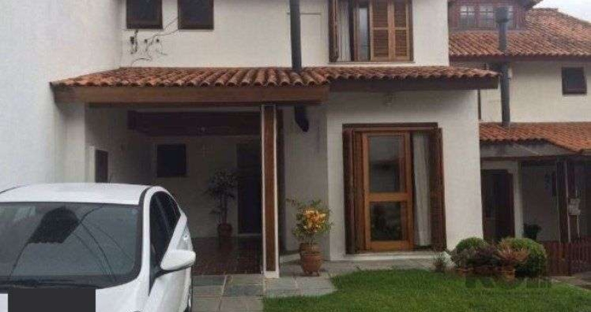Casa em condomínio fechado com 3 quartos à venda na Avenida Eduardo Prado, 695, Cavalhada, Porto Alegre
