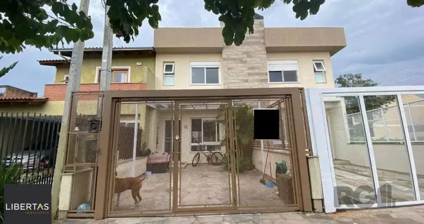 Casa com 3 quartos à venda na Rua Manacá, 32, Hípica, Porto Alegre