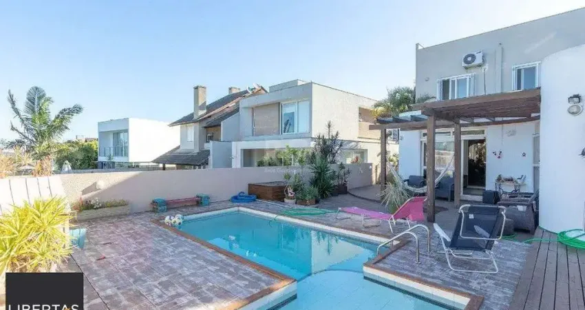 Casa com 4 quartos à venda na Avenida Edgar Pires de Castro, 540, Hípica, Porto Alegre