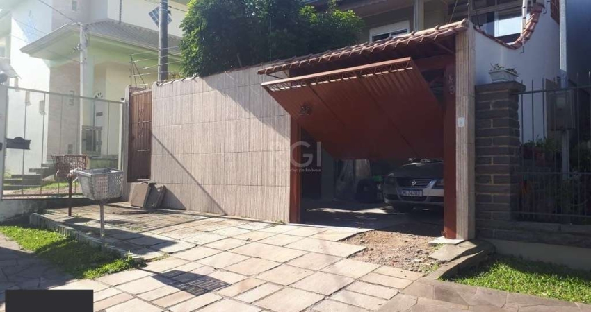 Casa com 3 quartos à venda na Rua José Pereira da Cunha, 49, Vila Nova, Porto Alegre