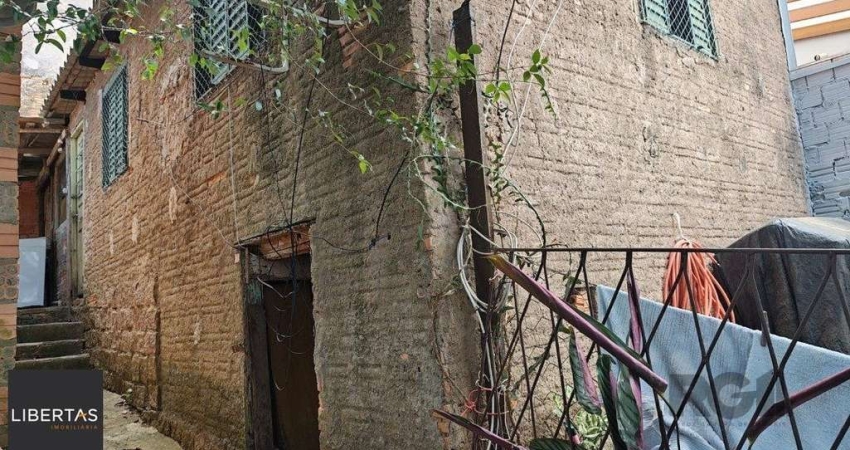 Casa com 3 quartos à venda na Rua Marquês do Maricá, 978, Vila Nova, Porto Alegre