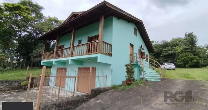 Casa com 3 quartos à venda na Avenida Santo Dias da Silva, 924, Lomba do Pinheiro, Porto Alegre