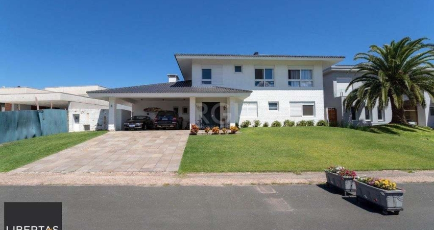 casa no Condomínio Terra Ville com 5 suítes, sendo duas suítes master, duas suítes americanas e uma suíte térrea.