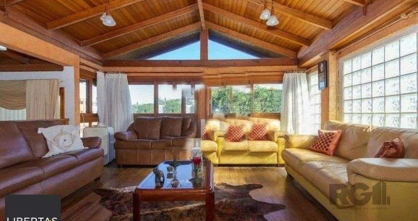 Casa com 4 quartos à venda na Rua Geraldo Souza Moreira, 156, Passo da Areia, Porto Alegre