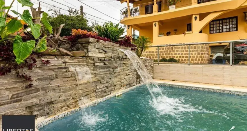 Casa com 4 quartos à venda na Rua Moacir Bastiani, 334, Campo Novo, Porto Alegre