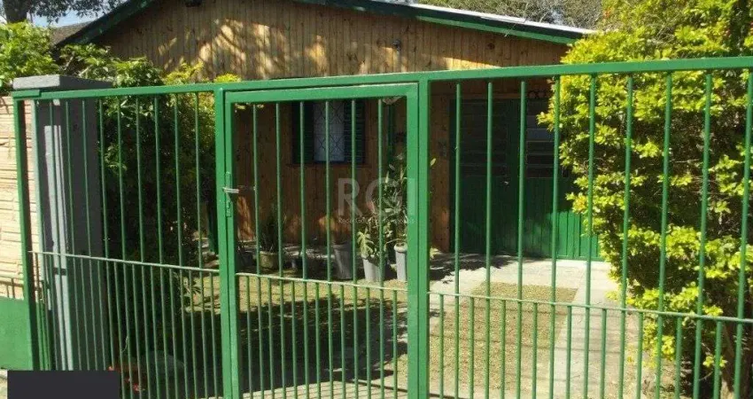 Casa com 3 quartos à venda na Rua Paulo Rubilar de Farias, 65, Restinga, Porto Alegre