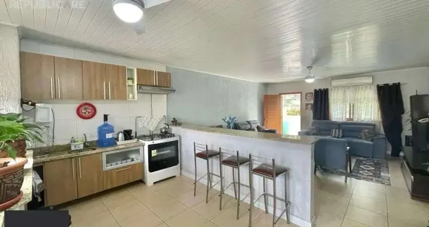 Casa com 2 quartos à venda na Rua Doze de Outubro, 664, Partenon, Porto Alegre