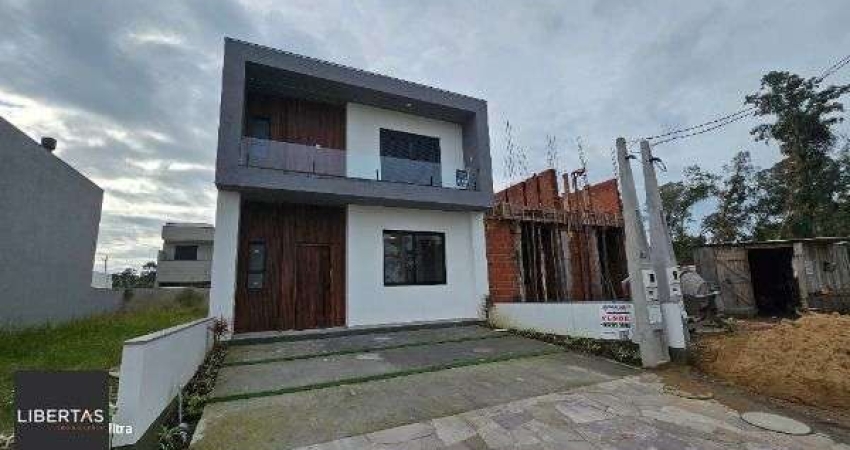 Casa em Porto Alegre, no bairro Hípica, com 3 dormitório(s), e 3 banheiros, à venda.