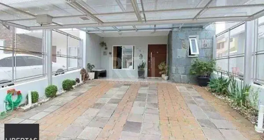 Casa em Porto Alegre, no bairro Hípica, com 3 dormitório(s), e 3 banheiros, à venda.