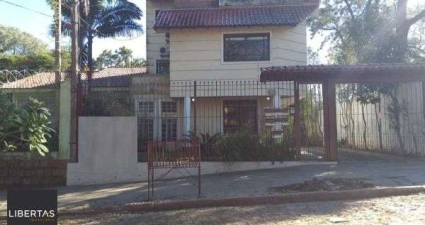 Casa em condomínio fechado com 4 quartos à venda na Rua Upamaroti, 1129, Cristal, Porto Alegre