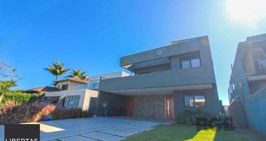 Casa Condominio em Porto Alegre, no bairro Belém Novo, com 4 dormitório(s), e 4 banheiros, à venda.
