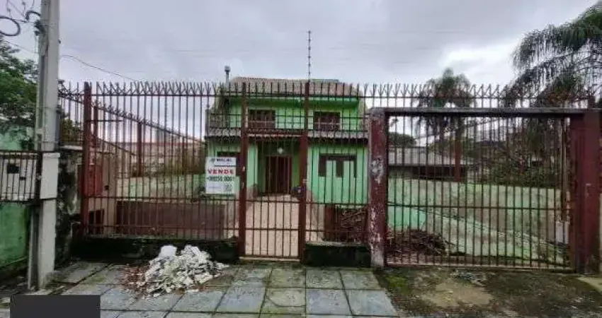 Sobrado em Porto Alegre, no bairro Glória, com 5 dormitório(s), e 5 banheiros, à venda.
