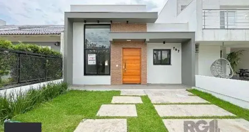 Casa em Porto Alegre, no bairro Hípica, com 3 dormitório(s), e 3 banheiros, à venda.