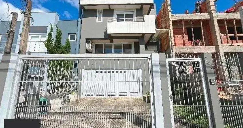 Casa em Porto Alegre, no bairro Hípica, com 3 dormitório(s), e 3 banheiros, à venda.