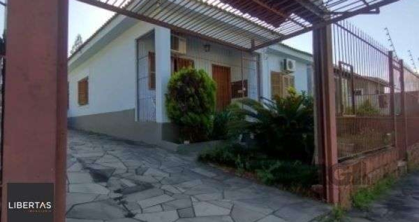 Casa com 3 quartos à venda na Rua dos Apóstolos, 423, Nonoai, Porto Alegre