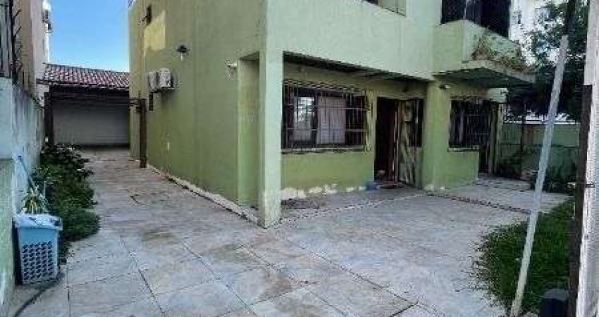 Casa com 6 quartos à venda na Rua Inhanduí, 193, Cristal, Porto Alegre