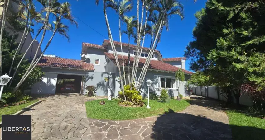 Casa em Porto Alegre, no bairro Ipanema, com 3 dormitório(s), à venda.