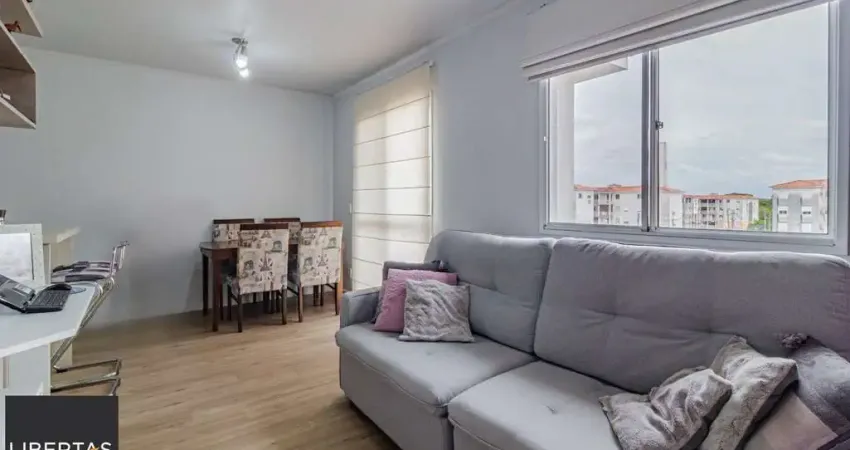 Apartamento com 2 dormitórios e 1 vaga de garagem escriturada no Bairro Humaitá