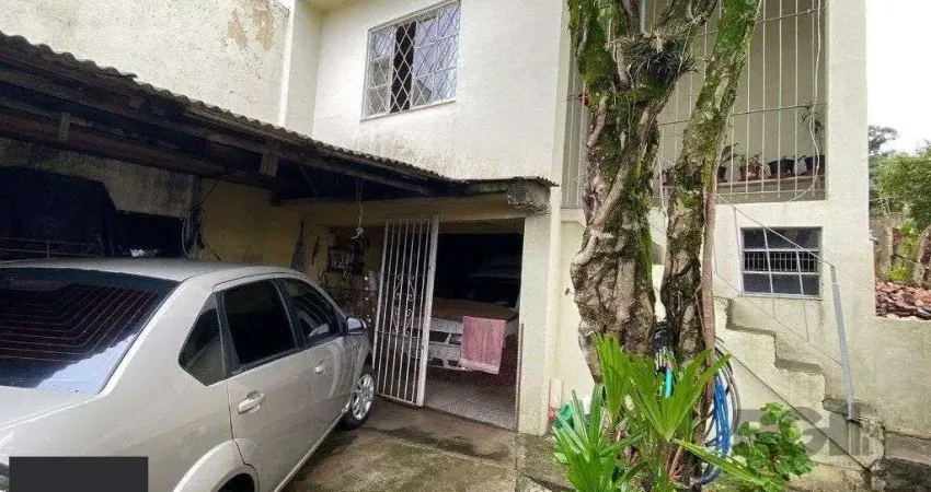 Casa com 2 quartos à venda na Rua Figueira Centenária, 229, Vila Nova, Porto Alegre