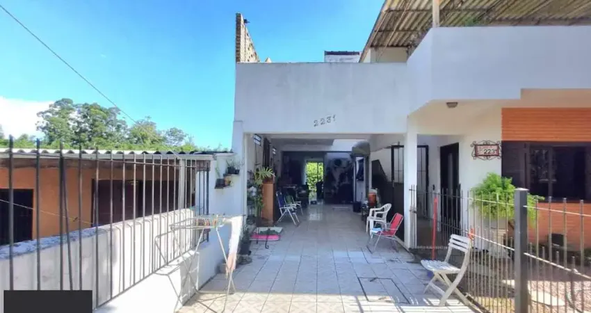 Casa com 5 quartos à venda na Avenida Vicente Monteggia, 2231, Cavalhada, Porto Alegre