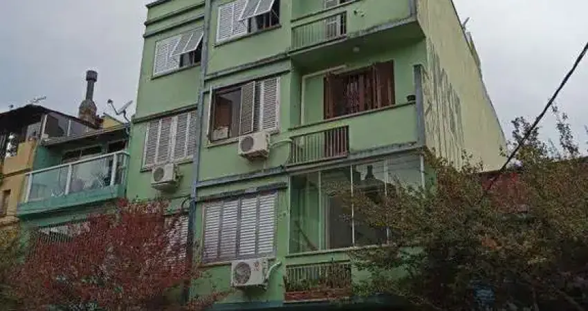 Apartamento à venda na Cidade Baixa – 2 dormitórios, de frente, com sacada integrada – Somente para investidor.