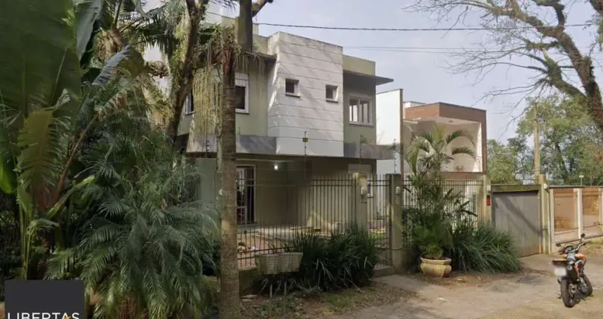 Casa 367m², 3 dormitórios, 4 vagas no bairro Ipanema