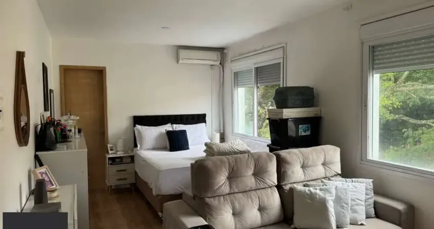 Apartamento JK com garagem escriturada no bairro Tristeza em Porto Alegre