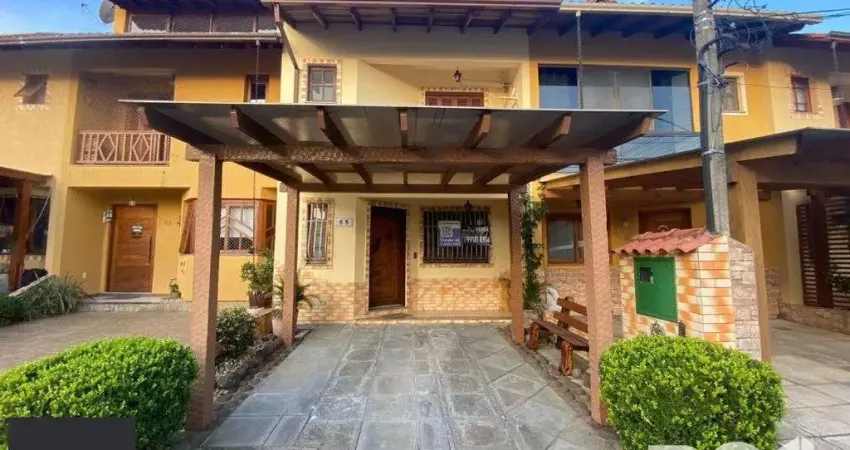 Casa com 3 quartos à venda na Avenida Edgar Pires de Castro, 1286, Hípica, Porto Alegre