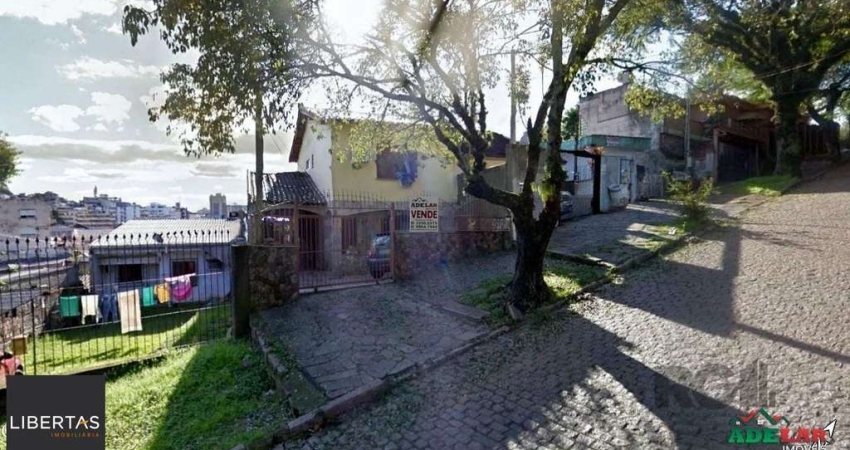 Casa com 3 quartos à venda na Avenida Teresina, 249, Medianeira, Porto Alegre