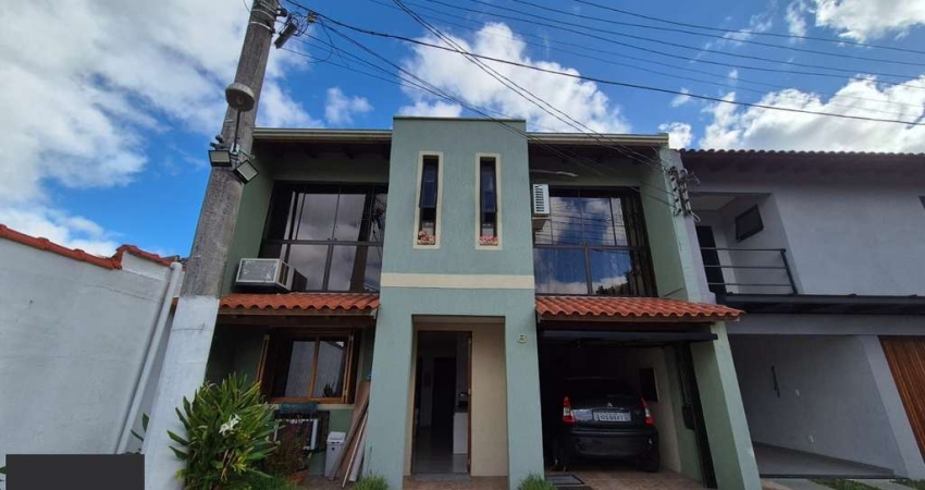 Casa em condomínio fechado com 3 quartos à venda na Avenida da Cavalhada, 6445, Cavalhada, Porto Alegre