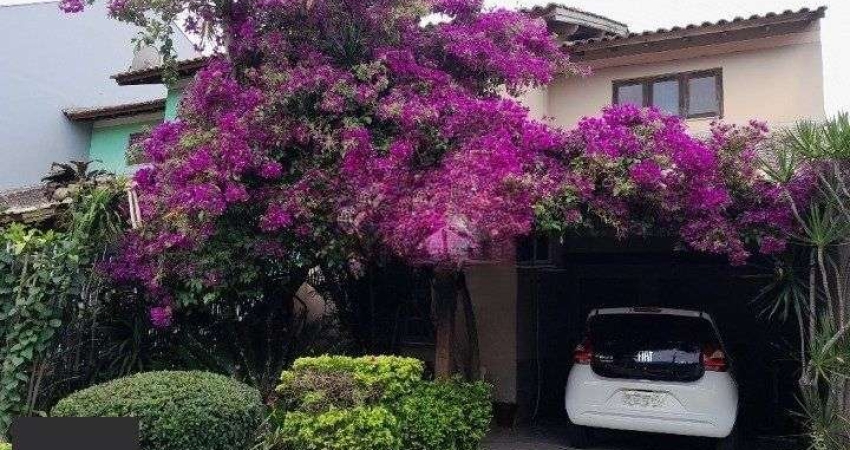 Casa 3 dormitórios para venda no bairro Hípica Condomínio Jardins do Prado.