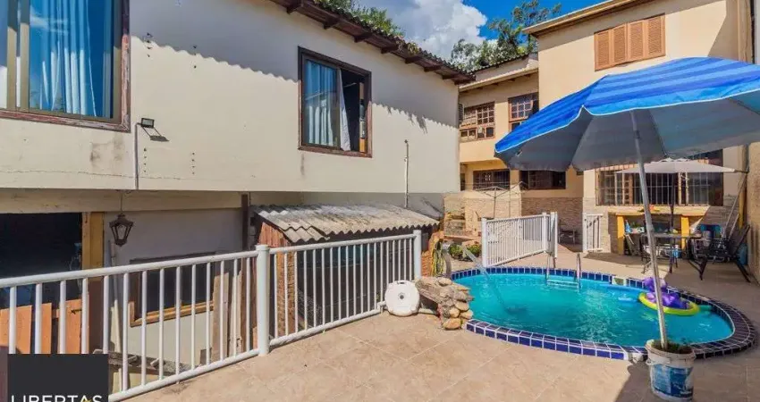 Casa 4 dormitórios à venda no Bairro Nonoai - Porto Alegre