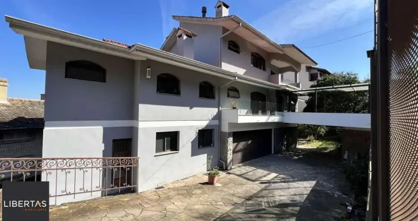 Casa com 4 quartos à venda na Rua Professor Xavier Simões, 467, Tristeza, Porto Alegre