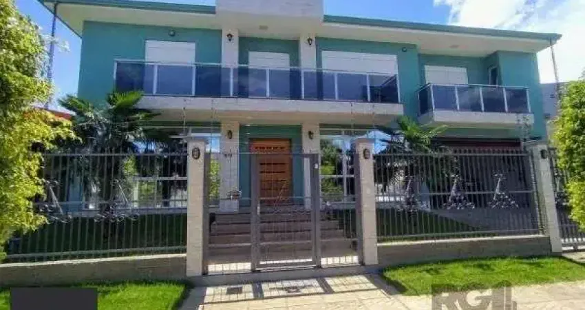 Casa em Porto Alegre, no bairro Hípica, com 3 dormitório(s), e 3 banheiros, à venda.