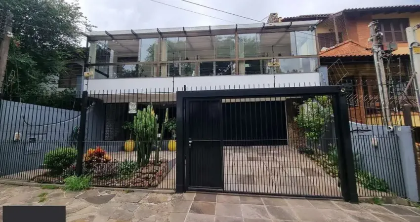 Casa com 3 quartos à venda na Rua Canto e Melo, 34, Nonoai, Porto Alegre