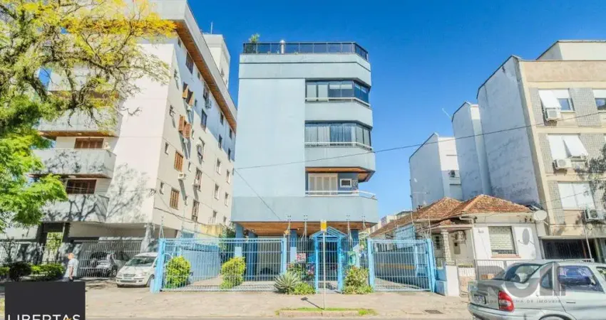 Apartamento de um dormitório, sacada e uma vaga de garagem no bairro Rio Branco em Porto Alegre.