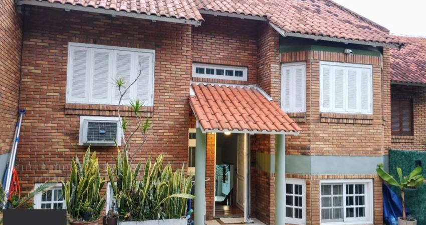 Casa em condomínio fechado com 3 quartos à venda na Rua Simão Bolívar, 915, Vila Conceição, Porto Alegre