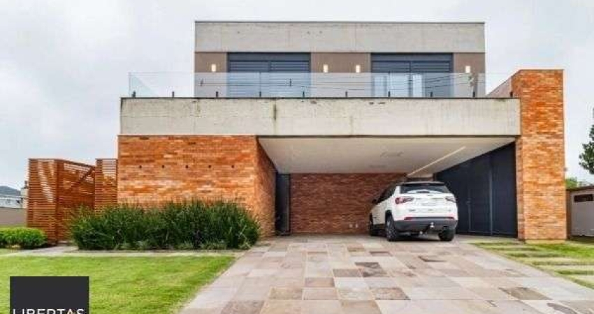 Casa em Condomínio à venda com 4 dormitórios, 488m² e 4 vagas no bairro Alphaville, Zona Sul de Porto Alegre