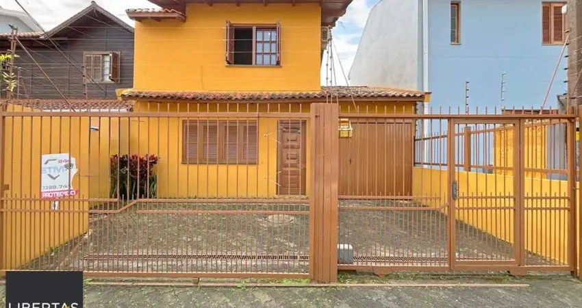 Casa com 3 quartos à venda na Rua Giobatta Giuseppe Petracco, 220, Vila Nova, Porto Alegre