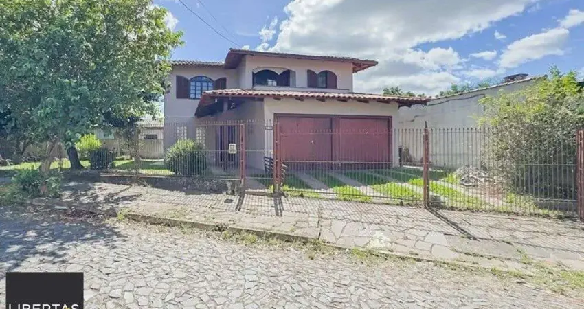 Casa com 5 quartos à venda na Rua Vicente Celestino, 430, Parque Dos Maias, Porto Alegre