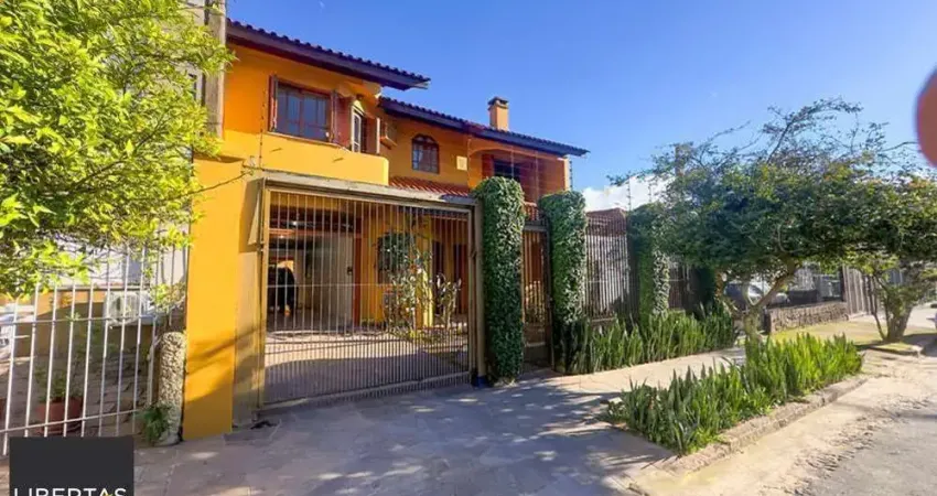 Casa com 4 quartos à venda na Rua Coronel Jaime da Costa Pereira, 340, Partenon, Porto Alegre