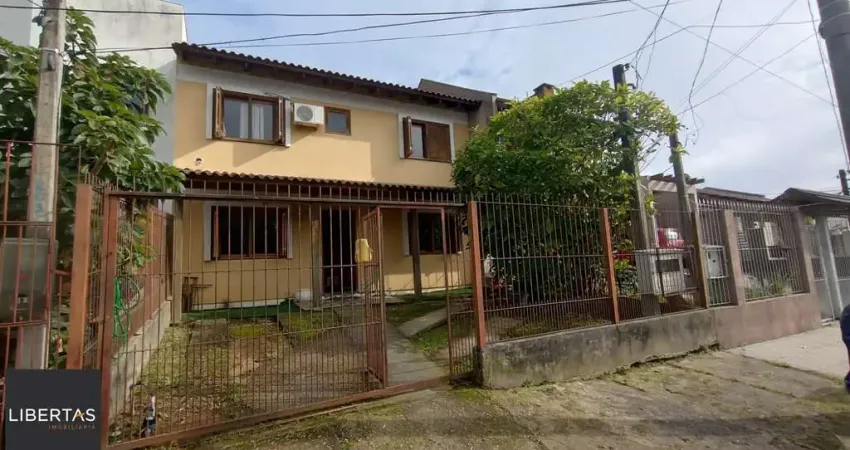 Casa com 4 quartos à venda na Rua Doutor Cláudio Walter Ferreira da Silva, 191, Guarujá, Porto Alegre