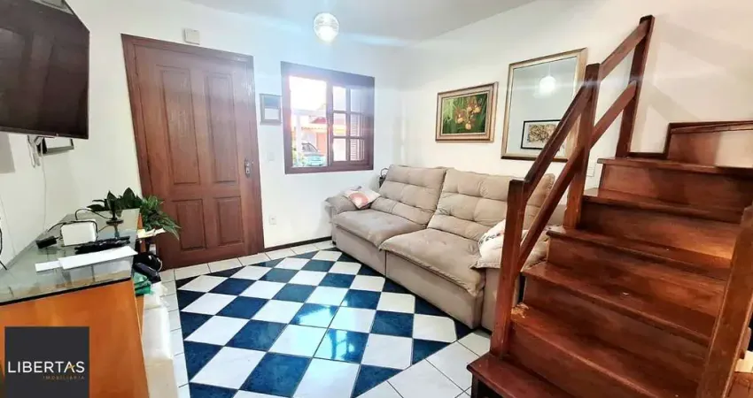 Casa com 2 dormitórios, 1 vaga, na av. otto niemeyer, bairro camaquã, poa, rs