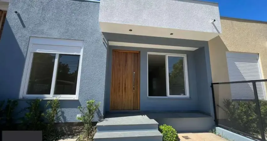 Casa com 3 quartos à venda na Rua Criciúma, 35, Guarujá, Porto Alegre