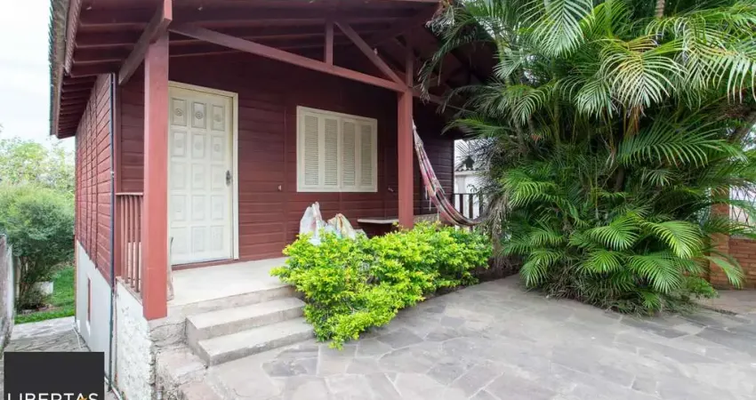 Casa com 2 quartos à venda na Rua Cláudio Rodrigues Nunes, 45, Vila Nova, Porto Alegre