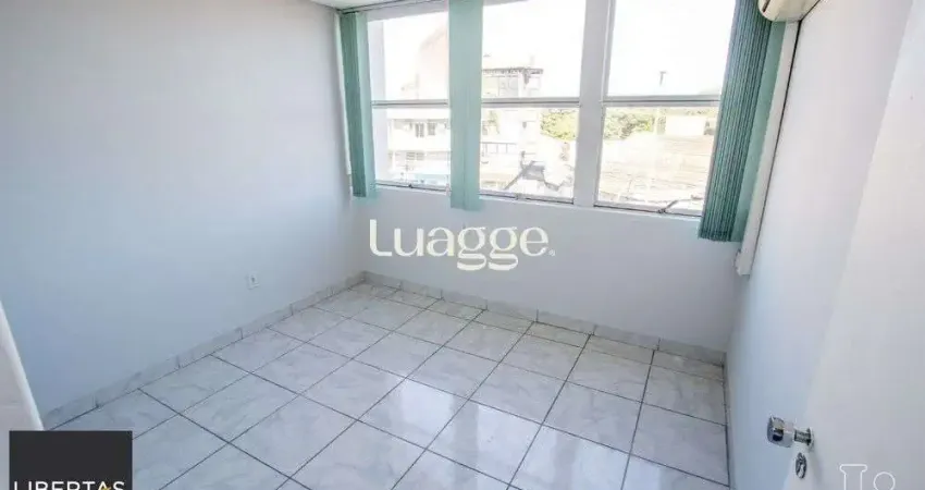 Sala comercial com 22m² de área privativa, frente, piso cerâmico, equipada com lavabo e ar-condicionado split