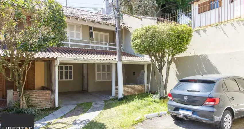 Casa em condomínio fechado com 3 quartos à venda na Avenida Juca Batista, 1492, Cavalhada, Porto Alegre