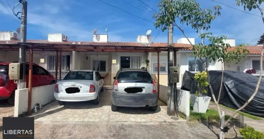 Casa em condomínio fechado com 2 quartos à venda na Estrada Costa Gama, 5124, Hípica, Porto Alegre